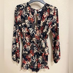 Long sleeved multicolor romper size M